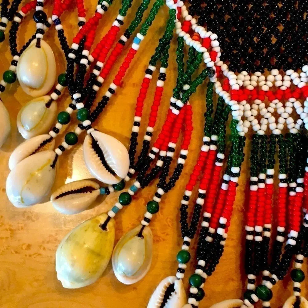Vintage 60’s tie beaded dance skirt necklace or wall hanging cowrie shell bead